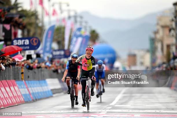 Magnus Cort of Denmark and Team EF Education-EasyPost celebrates at finish line as stage winner ahead of Derek Gee of Canada and Team Israel -...