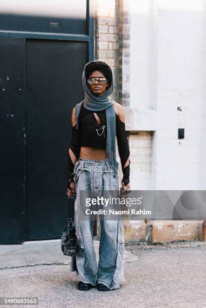 Guest wears Inner Sanctum and Salt Murphy clothing at Afterpay Australian Fashion Week 2023 at Carriageworks on May 16, 2023 in Sydney, Australia.