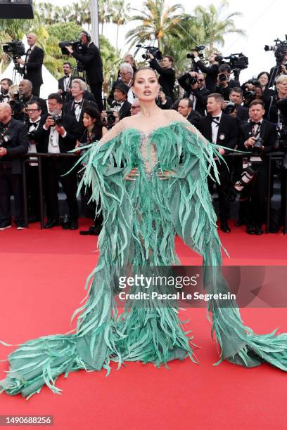 Victoria Bonya attends the "Jeanne du Barry" Screening & opening ceremony red carpet at the 76th annual Cannes film festival at Palais des Festivals...