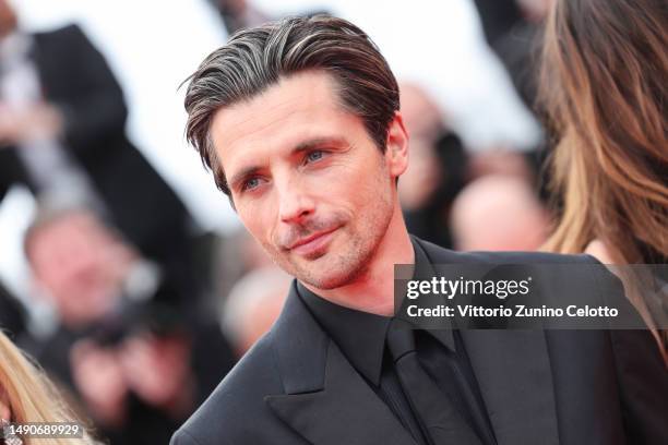 Member of the Camera d'Or Jury Raphaël Personnaz attends the "Jeanne du Barry" Screening & opening ceremony red carpet at the 76th annual Cannes film...