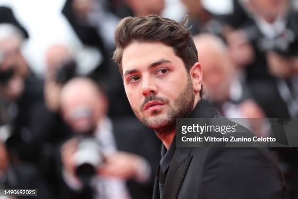 Xavier Dolan attends the "Jeanne du Barry" Screening & opening ceremony red carpet at the 76th annual Cannes film festival at Palais des Festivals on...
