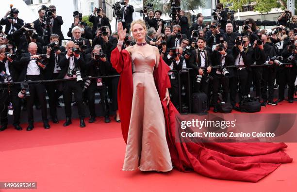 Uma Thurman attends the "Jeanne du Barry" Screening & opening ceremony red carpet at the 76th annual Cannes film festival at Palais des Festivals on...