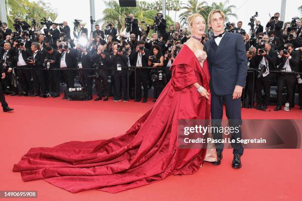 Uma Thurman and Levon Roan Thurman-Hawke attend the "Jeanne du Barry" Screening & opening ceremony red carpet at the 76th annual Cannes film festival...