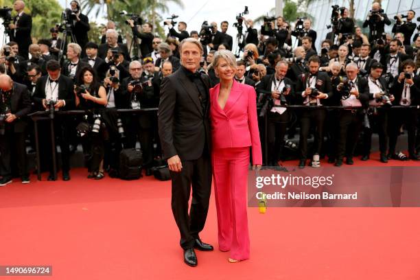 Mads Mikkelsen and Hanne Jacobsen attend the "Jeanne du Barry" Screening & opening ceremony red carpet at the 76th annual Cannes film festival at...