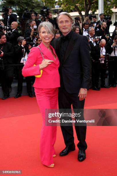 Hanne Jacobsen and Mads Mikkelsen attend the "Jeanne du Barry" Screening & opening ceremony red carpet at the 76th annual Cannes film festival at...