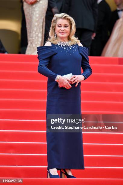 Catherine Deneuve attends the "Jeanne du Barry" Screening & opening ceremony red carpet at the 76th annual Cannes film festival at Palais des...