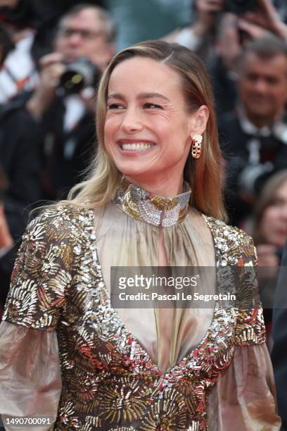 Brie Larson attends the "Jeanne du Barry" Screening & opening ceremony red carpet at the 76th annual Cannes film festival at Palais des Festivals on...
