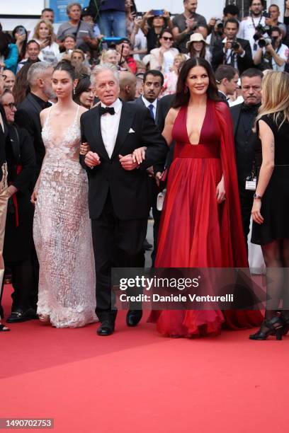 Carys Zeta, Michael Douglas and Catherine Zeta-Jones attend the "Jeanne du Barry" Screening & opening ceremony red carpet at the 76th annual Cannes...