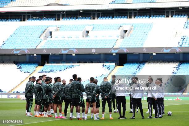 General view of Real Madrid players talking with coaching staff during a training session ahead of their UEFA Champions League semi-final second leg...