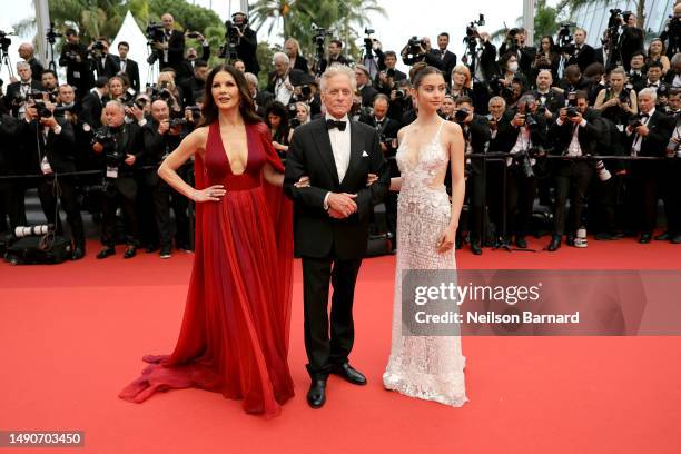 Catherine Zeta-Jones, Michael Douglas and Carys Zeta Douglas attend the "Jeanne du Barry" Screening & opening ceremony red carpet at the 76th annual...