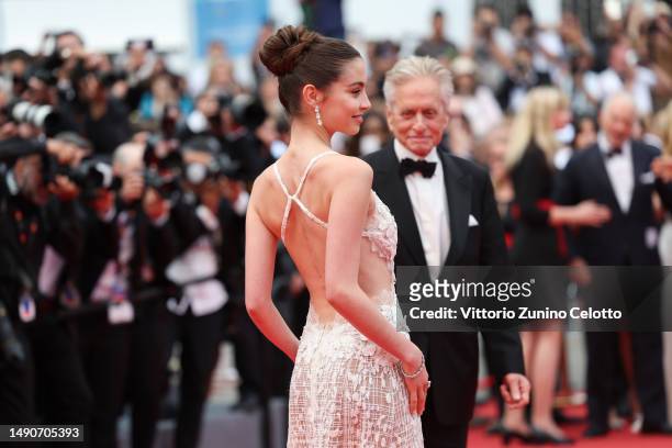 Carys Zeta Douglas and Michael Douglas attend the "Jeanne du Barry" Screening & opening ceremony red carpet at the 76th annual Cannes film festival...