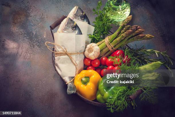 basket full of fresh groceries - sea bream stock pictures, royalty-free photos & images