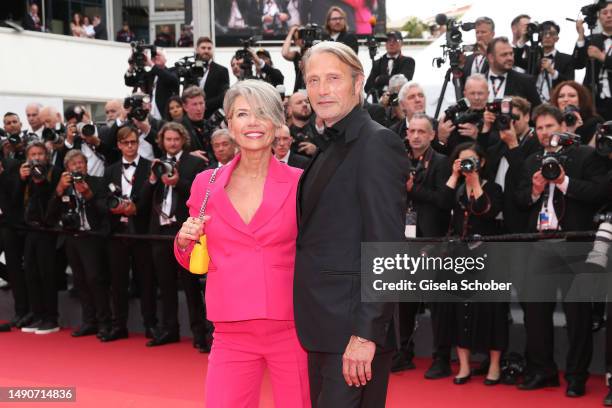 Hanne Jacobsen and Mads Mikkelsen attend the "Jeanne du Barry" Screening & opening ceremony red carpet at the 76th annual Cannes film festival at...