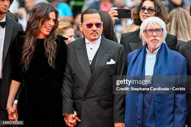 Director Maïwenn, Johnny Depp, Pierre Richard attend the "Jeanne du Barry" Screening & opening ceremony red carpet at the 76th annual Cannes film...