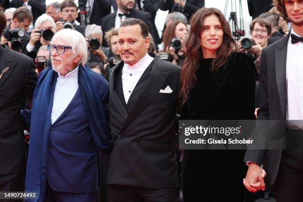 Pierre Richard, Johnny Depp and Maïwenn attend the "Jeanne du Barry" Screening & opening ceremony red carpet at the 76th annual Cannes film festival...