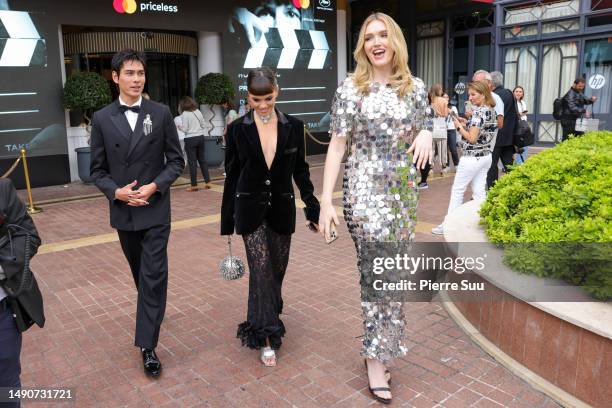 Evan Mock, Martina Cariddi and Maddison Brown are seen at Hotel Le Majestic during the 76th Cannes film festival on May 16, 2023 in Cannes, France.