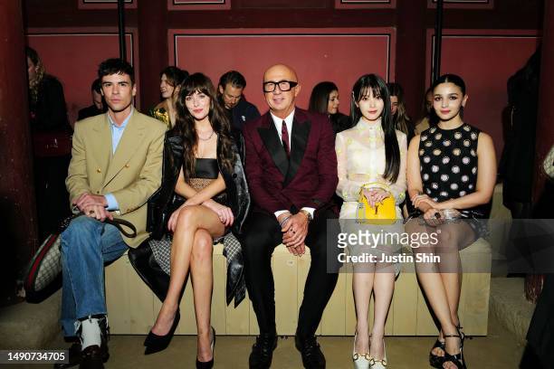 Blake Lee, Dakota Johnson, Marco Bizzarri, IU and Alia Bhatt attend the Gucci Seoul Cruise 2024 fashion show at Gyeongbokgung Palace on May 16, 2023...
