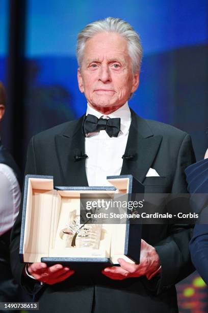 Michael Douglas receives the Honorary Palme D’Or during the opening ceremony at the 76th annual Cannes film festival at Palais des Festivals on May...