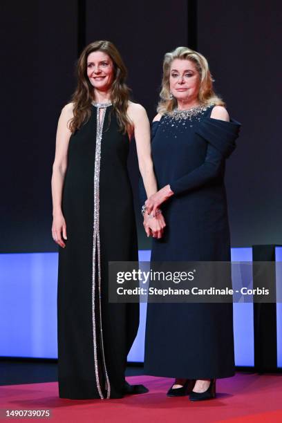 Chiara Mastroianni and Catherine Deneuve during the opening ceremony at the 76th annual Cannes film festival at Palais des Festivals on May 16, 2023...