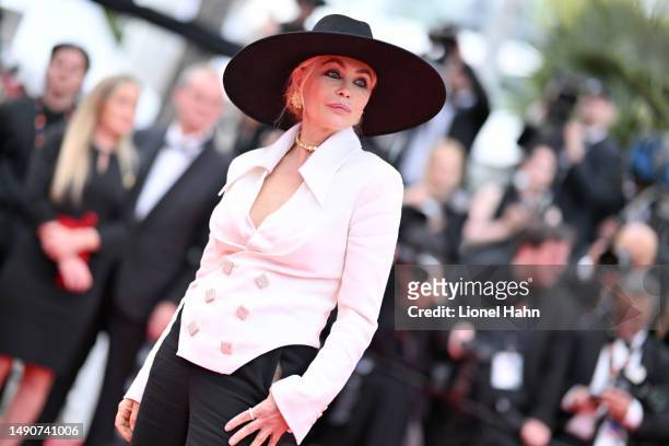 Emmanuelle Beart attends the "Jeanne du Barry" screening & opening ceremony red carpet at the 76th Annual Cannes Film Festival at Palais des...