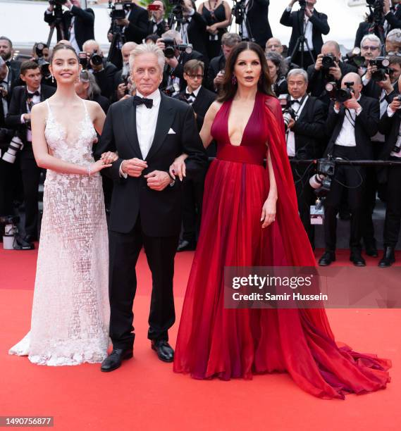 Carys Zeta Douglas, Michael Douglas and Catherine Zeta-Jones attend the "Jeanne du Barry" Screening & opening ceremony red carpet at the 76th annual...