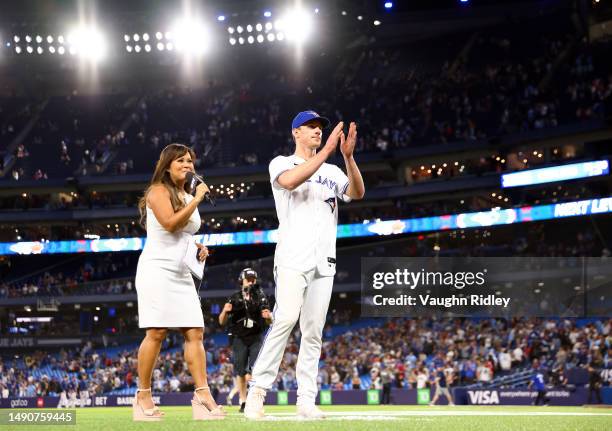 Chris Bassitt of the Toronto Blue Jays speaks to Sportsnets Hazel Mae after throwing a complete game against the Atlanta Braves at Rogers Centre on...