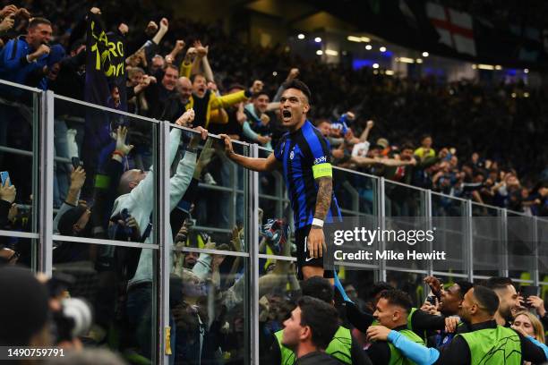 Lautaro Martinez of FC Internazionale celebrates with fans after scoring the team's first goal during the UEFA Champions League semi-final second leg...