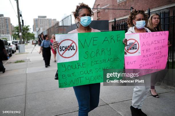 Residents, students and parents gather for as protest in front of P.S. 188 in Coney Island which has recently begun housing asylum seekers in the...