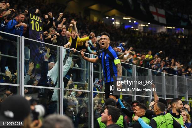 Lautaro Martinez of FC Internazionale celebrates with fans after scoring the team's first goal during the UEFA Champions League semi-final second leg...