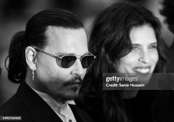 Johnny Depp and Maiwenn attend the "Jeanne du Barry" Screening & opening ceremony red carpet at the 76th annual Cannes film festival at Palais des...