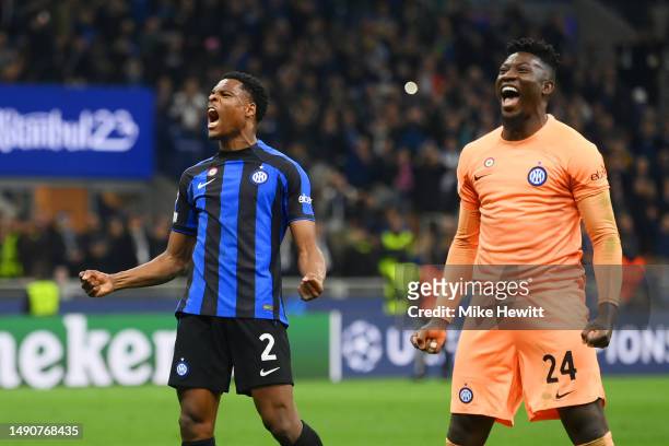Denzel Dumfries and Andre Onana of FC Internazionale celebrate the team's victory after the final whistle of the UEFA Champions League semi-final...