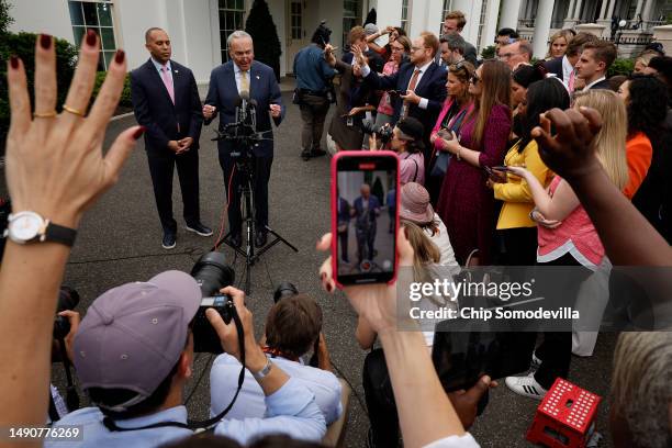 House Minority Leader Hakeem Jeffries and Senate Majority Leader Charles Schumer talk to reporters outside the West Wing following a meeting with...