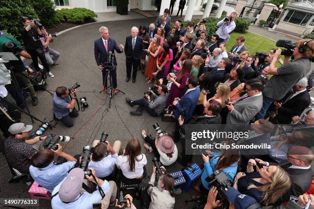 Speaker of the House Kevin McCarthy and Senate Minority Leader Mitch McConnell talk to reporters outside the West Wing after meeting with U.S....