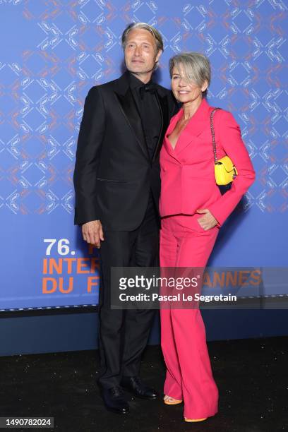 Mads Mikkelsen and Hanne Jacobsen attends the opening ceremony gala dinner at the 76th annual Cannes film festival at Carlton Hotel on May 16, 2023...