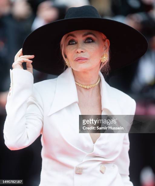 Emmanuelle Beart attends the "Jeanne du Barry" Screening & opening ceremony red carpet at the 76th annual Cannes film festival at Palais des...