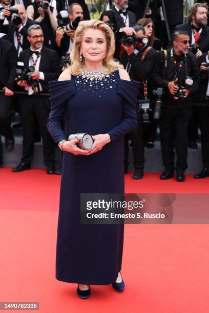 Catherine Deneuve attends the "Jeanne du Barry" Screening & opening ceremony red carpet at the 76th annual Cannes film festival at Palais des...