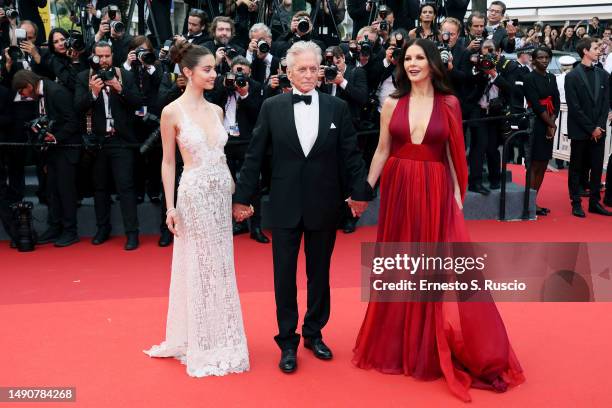 Carys Zeta, Michael Douglas and Catherine Zeta-Jones attend the "Jeanne du Barry" Screening & opening ceremony red carpet at the 76th annual Cannes...