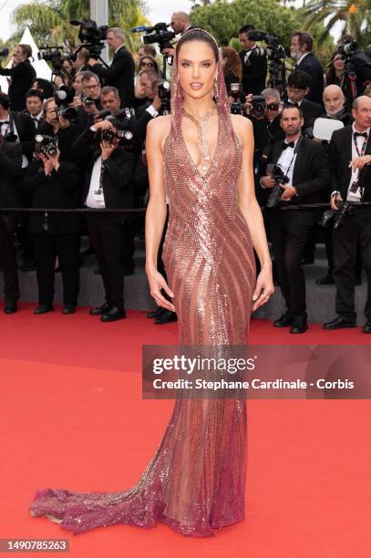 Alessandra Ambrosio attends the "Jeanne du Barry" Screening & opening ceremony red carpet at the 76th annual Cannes film festival at Palais des...