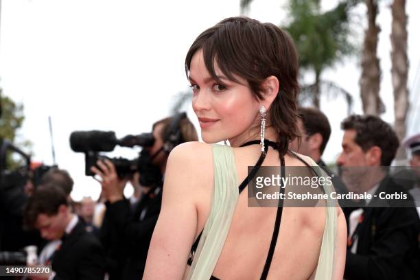 Emilia Schule attends the "Jeanne du Barry" Screening & opening ceremony red carpet at the 76th annual Cannes film festival at Palais des Festivals...