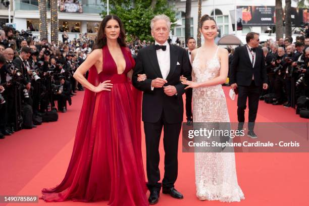 Catherine Zeta-Jones, Michael Douglas and Carys Zeta Douglas attends the "Jeanne du Barry" Screening & opening ceremony red carpet at the 76th annual...