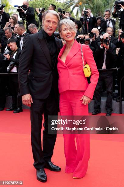 Mads Mikkelsen and Hanne Jacobsen attend the "Jeanne du Barry" Screening & opening ceremony red carpet at the 76th annual Cannes film festival at...