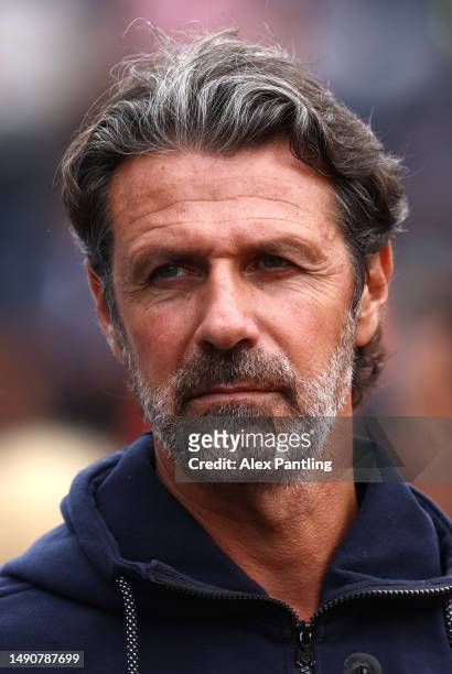 Coach of Holger Rune, Patrick Mouratoglou looks on from the stands as Holger Rune of Denmark play Alexei Popyrin of Australia during their Men's...