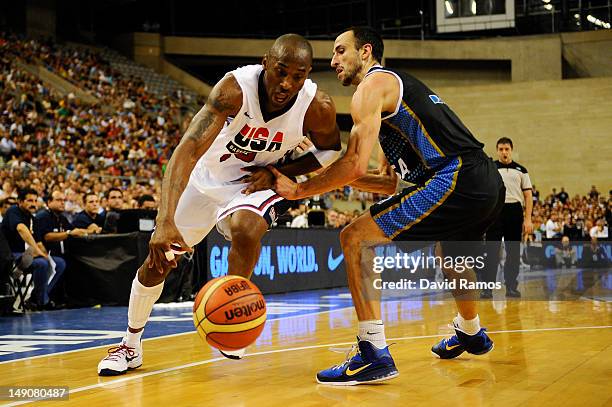 Kobe Bryant of the US Men's Senior National Team drives to the basket to the basket against Emanuel Ginobili of the Argentina Men's Senior National...