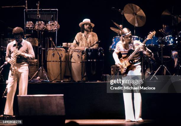 American jazz saxophonist Wayne Shorter , percussionist Manolo Badrena, American jazz bassist, composer and producer Jaco Pastorius and drummer Alex...