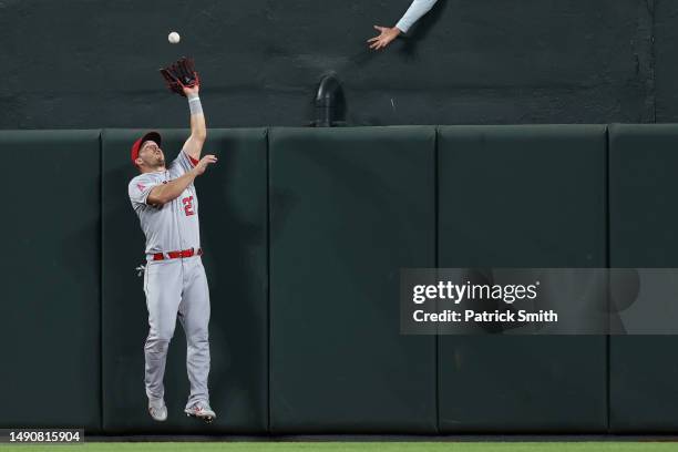 Mike Trout of the Los Angeles Angels makes a catch on a hit by Austin Hays of the Baltimore Orioles during the seventh inning at Oriole Park at...