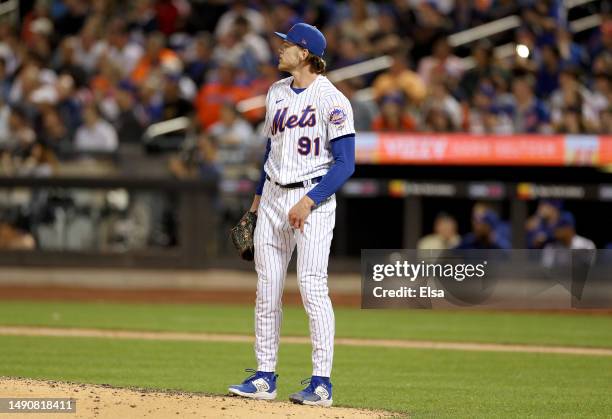 Josh Walker of the New York Mets reacts as a hit is caught for the final out in the seventh inning against the Tampa Bay Rays at Citi Field on May...