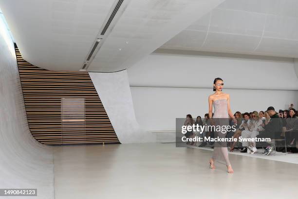 Model walks the runway during the Henne show during Afterpay Australian Fashion Week 2023 at St Barnabas Anglican Church on May 17, 2023 in Sydney,...