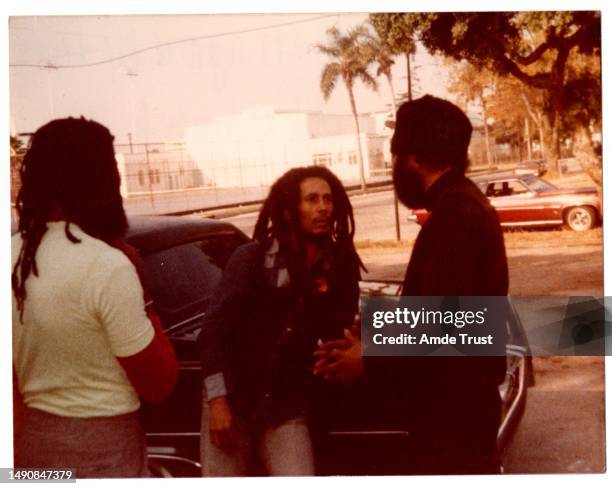 Reggae singer Bob Marley meets with Fr. Amde Hamilton and friend Tony G at the St.Tekle Haymonot Ethiopian Orthodox Church with Compton High School...