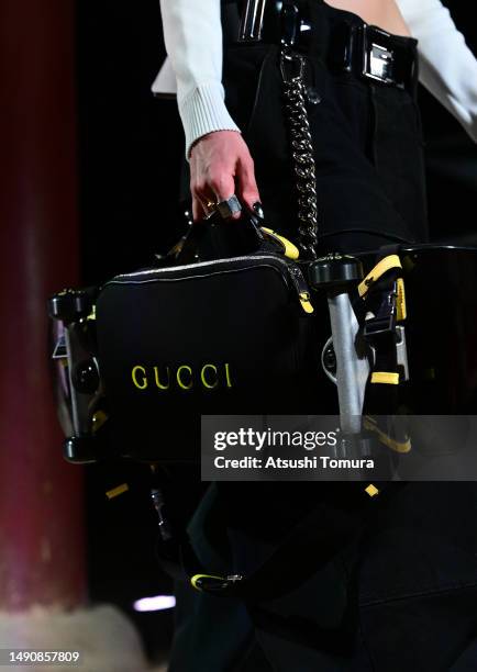 Model, bag detail, walks the runway during the Gucci Seoul Cruise 2024 fashion show at Gyeongbokgung Palace on May 16, 2023 in Seoul, South Korea.