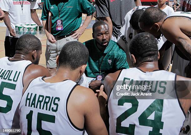 Head Coach Anthony Goldwire of the Milwaukee Bucks talks in the huddle against the Chicago Bulls during NBA Summer League on July 22, 2012 at Cox...